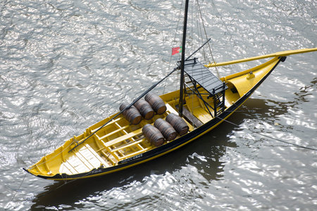 the port wine Boats at the waterfront with the old town on the Douro River in Ribeira in the city...
