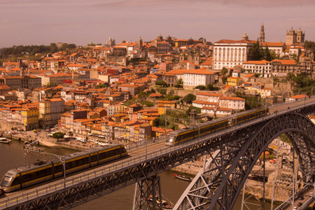 the Ponte de Dom Luis 1 at the old town on the Douro River in Ribeira in the city centre of Porto in...