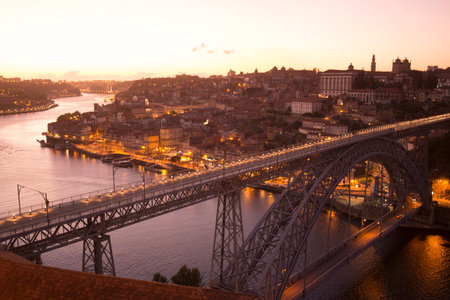 the Ponte de Dom Luis 1 at the old town on the Douro River in Ribeira in the city centre of Porto in...