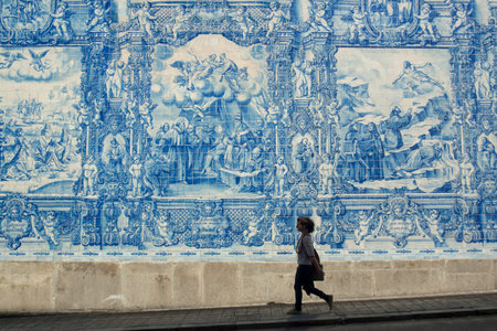 hand painted tile azulejo in the old town of  ribeira in the city centre of Porto in Porugal in Europe.のeditorial素材
