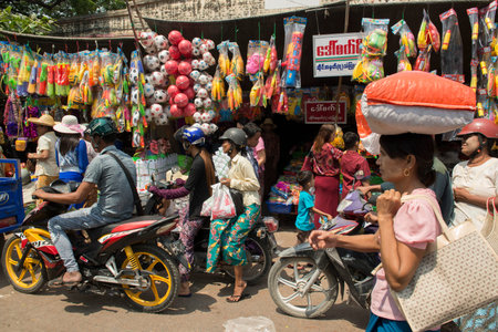 a shop at a marketstreet in the City of Mandalay in Myanmar in Southeastasia.のeditorial素材
