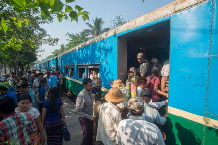 a train of the Yangon circle train in a trainstation near the City of Yangon in Myanmar in...