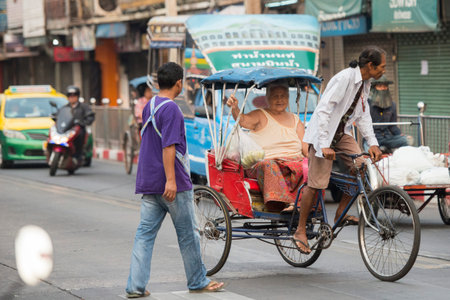 Bicycle Ricksha Taxis at the morning Market in Nothaburi in the north of city of Bangkok in Thailand...