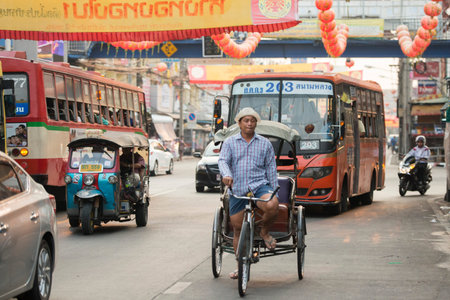 Bicycle Ricksha Taxis at the morning Market in Nothaburi in the north of city of Bangkok in Thailand...