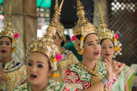 Traditional Dancers at the Erawan Shrine at Pratunam in the Citycentre of Bangkok in Thailand in...
