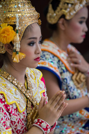 Traditional Dancers at the Erawan Shrine at Pratunam in the Citycentre of Bangkok in Thailand in...