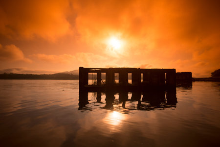 the floodet Wat Sam Prasop in the  landscape at the Khao Laem Lake in the Village of Sangkhlaburi north of the City of Kanchanaburi in Central Thailand in Southeastasia.のeditorial素材