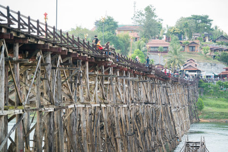 the Wang Kka Wooden Bridge in the  landscape at the Khao Laem Lake in the Village of Sangkhlaburi north of the City of Kanchanaburi in Central Thailand in Southeastasia.のeditorial素材