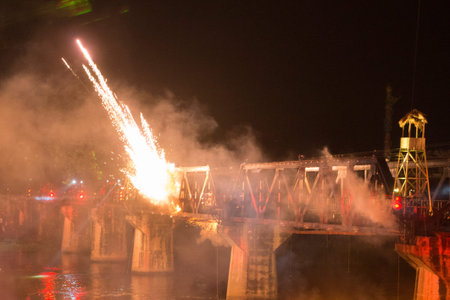 a Sound and light show at the Death Railway Bridge over the River Kwai of the Burma-Thailand Railway in the City of Kanchanaburi in Central Thailand in Southeastasia.のeditorial素材