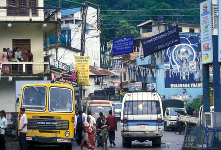 a shopping street in the town of Kandy of Sri Lanka in Asien.