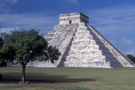 The Maya Ruins with the Kukulkan Pyramide of Chichen Itza in the Province Yucatan in Mexico in...
