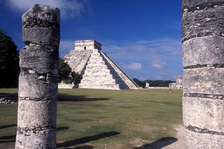 The Maya Ruins with the Kukulkan Pyramide of Chichen Itza in the Province Yucatan in Mexico in...