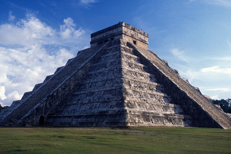 The Maya Ruins with the Kukulkan Pyramide of Chichen Itza in the Province Yucatan in Mexico in...