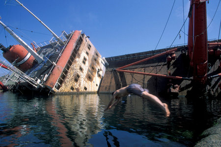 childern play at a Ship wreck in the Bospurus in the old town of the city Istanbul in Turkey. ...