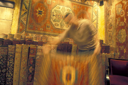 a carpet shop at a market street at the Old Souq or Bazaar Kapali Carsi Market in the old town of the city Istanbul in Turkey.  Turkey, Istanbul, May, 2002のeditorial素材