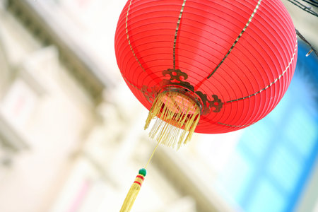 a traditional chinese lamp in china town in the city of Singapore in Southeastasia.のeditorial素材