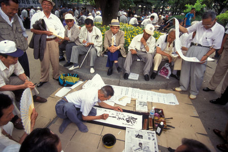 seniors and a calligrapher at the Tapkol Prk in the city of Seoul in South Korea in EastAasia.  Southkorea, Seoul, May, 2006のeditorial素材