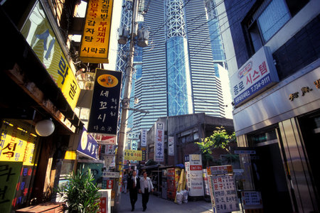 a shopping street in the city of Seoul in South Korea in EastAasia.  Southkorea, Seoul, May, 2006