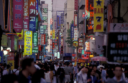 a shopping street in the city of Seoul in South Korea in EastAasia.  Southkorea, Seoul, May, 2006