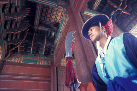 Historically dressed guard at the Daehanmun gate at the Toksugung Palace in the city of Seoul in South Korea in EastAasia.  Southkorea, Seoul, May, 2006のeditorial素材