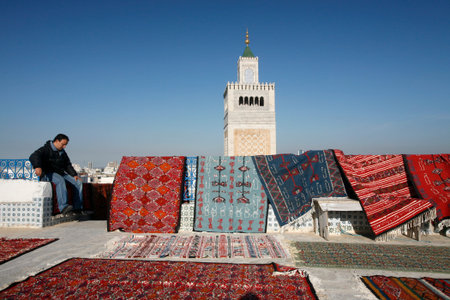 a Carpet Shop and Production in front of the Ez Zitouna or Al Zaytuna Mosque in the Medina of the Old City of Tunis in north of Tunisia in North Africa,  Tunisia, Sidi Bou Sair, March, 2009のeditorial素材