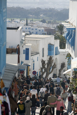 People in the Marketstreet in the Old Town of Sidi Bou Said near the City of Tunis in north of Tunisia in North Africa,  Tunisia, Sidi Bou Sair, March, 2009のeditorial素材