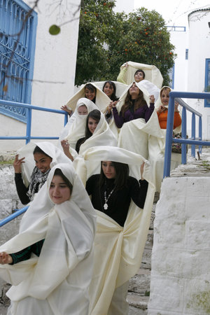 Tunisian Muslim Women in traditional Tunisia clothes in the Old Town of Sidi Bou Said near the City of Tunis in north of Tunisia in North Africa,  Tunisia, Sidi Bou Said, March, 2009のeditorial素材
