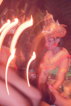 A Women at Traditional Bali Kecak Dance near the Temple of Ulu Watu Tempel on the Island Bali in...