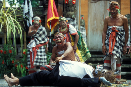 A Men at Traditional Bali Kecak Dance near the Temple of Ulu Watu Tempel on the Island Bali in...