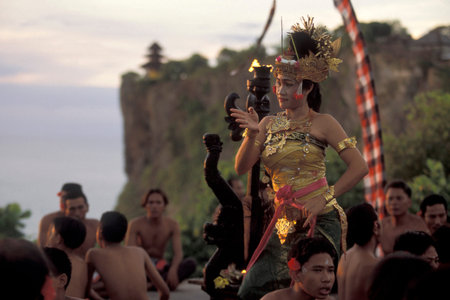 A Women at Traditional Bali Kecak Dance near the Temple of Ulu Watu Tempel on the Island Bali in Indonesia.  Indonesia, Bali, March, 2, 2001のeditorial素材