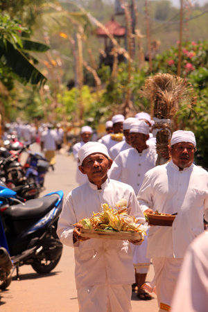 people at the big ceremony in the village on the Island Nusa Lembongan Island near the island Bali...