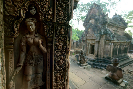 stone carving at a door of the Tempel Ruins of  Banteay Srei about 32 Km north of the Temple City of Angkor near the City of Siem Reap in the west of Cambodia.  Cambodia, Siem Reap, April 2014のeditorial素材