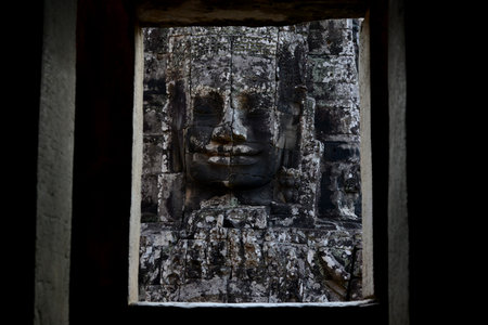 Stone face at the Bayon Temple the Tempel Ruins of Angkor Thom in the Temple City of Angkor near the...