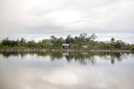 the Landscape with a Lake near the Town of Sra Em north of the city Preah Vihear in Northwaest Cambodia.  Cambodia, Sra Em, November, 2017,のeditorial素材