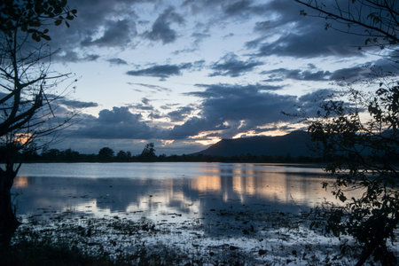 a landscape with sunset near the town Sra Em in the province of Preah Vihear in Northwest Cambodia.  Cambodia, Sra Em, November, 2017,のeditorial素材