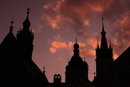 the Rynek Glowny square with the church of St Mary in the old town of Cracow in Poland in east...