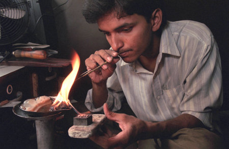 Working People in a Jewelry Factory in the City of Jaipur in the Province of Rajasthan in India. ...
