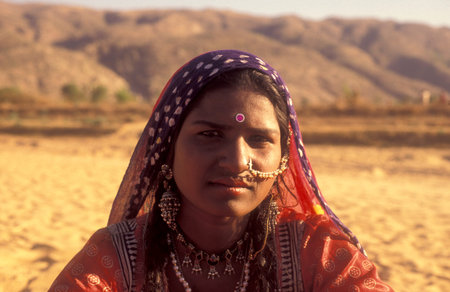 a portrait of a Rajasthani women in the Town of Jaisalmer in the Province of Rajasthan in India. ...