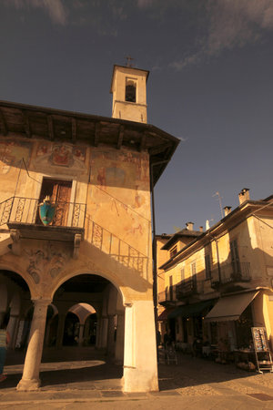 The community Palace or palazzo della comunita in the old town of the village of Orta on the Lake...