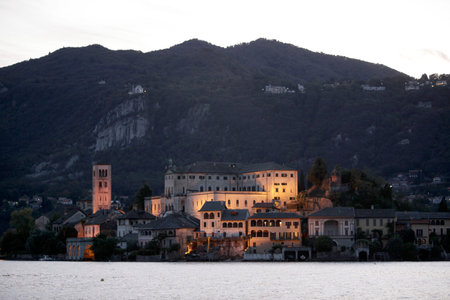 The Isla San Giulio in the Orta Lake near the Fishingvillage of Orta on the Lake Orta in Piemont in north Italy.  Italy, Piemont, October, 2011のeditorial素材