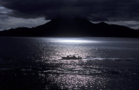 The Lake Atitlan mit the Volcanos of Toliman and San Pedro in the back at the Town of Panajachel in Guatemala in central America.のeditorial素材