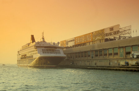 a cruise shio on the Victoria harbour in Tsim Sha Tsui in Kowloon in the city of Hongkong in Hongkong.  China, Hongkong, May, 1997のeditorial素材