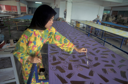 a Batik Textile painting and production in a Factory in the city of Kuala Lumpur in Malaysia.  Malaysia, Kuala Lumpur, August, 1997のeditorial素材