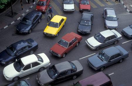 cars and Trafic on a road in the city of Kuala Lumpur in Malaysia.  Malaysia, Kuala Lumpur, January,...