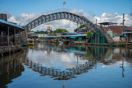 Wat Chai Bridge and Mosque Al Kubra at the Village Ban Nam Chiao in the Province of Trat in Thailand.  Thailand, Trat, November, 9, 2025.