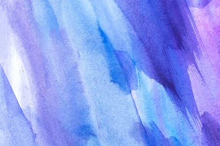 Abstract Hand painted blue purple watercolor background on wet paper, texture for creative wallpaper or design artwork.の写真素材
