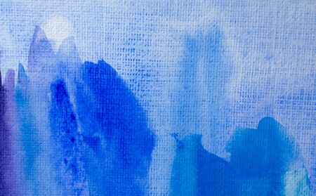 Abstract blue watercolor background with different layers on paper textureの写真素材