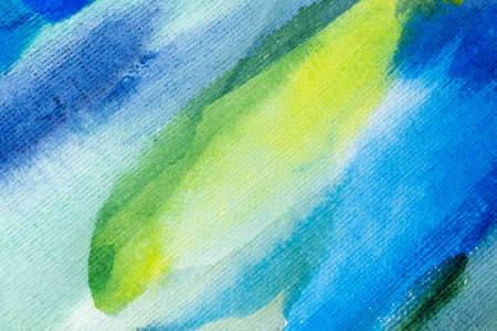 blue and green watercolors on paper texture, background design, hand painted elementの写真素材