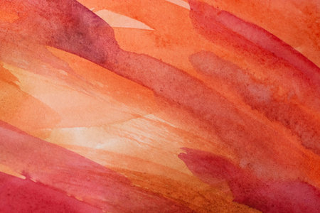red watercolors on paper texture, background design, hand painted elementの写真素材
