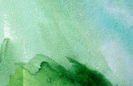 blue and green watercolors on paper texture, background design, hand painted elementの写真素材